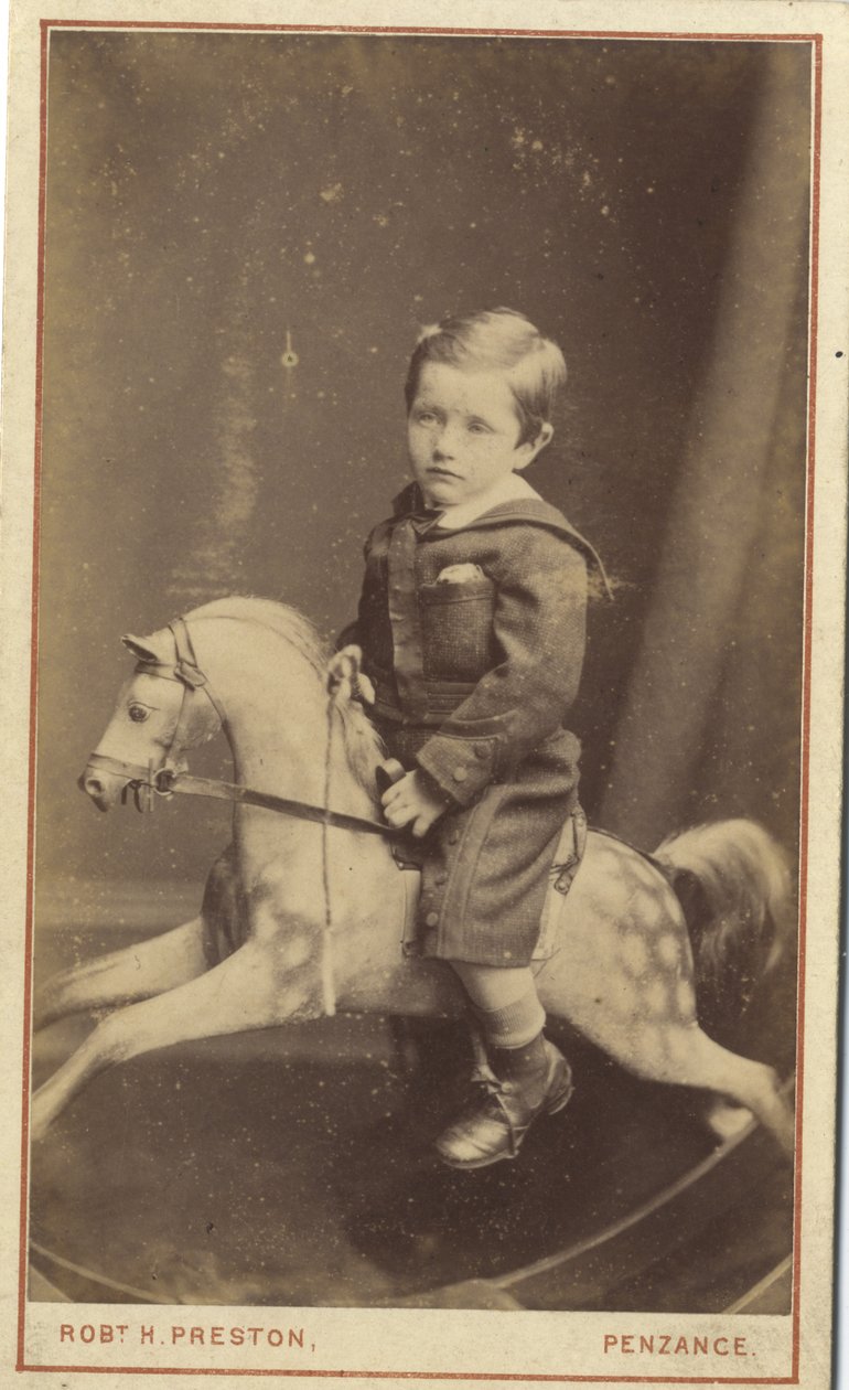 Jeune garçon assis sur un cheval à bascule, 1870s - Robert H. Preston