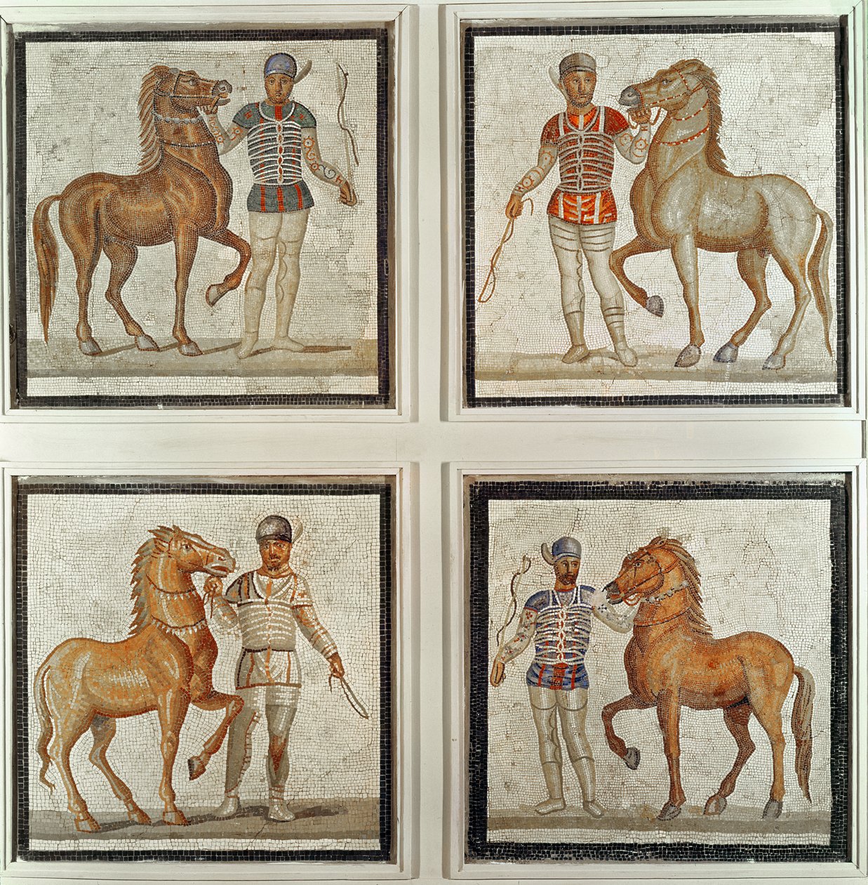 Quatre cavaliers dans leurs couleurs de course - Roman