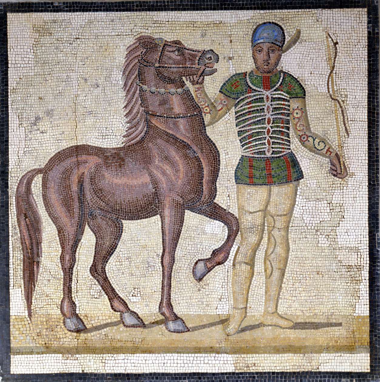 Représentation des quatre factions du cirque romain : les Verts (factio prasina). Les factions étaient des clubs engagés dans des compétitions de cirque dans le Haut Empire (1er siècle après J.-C.) et caractérisées par une couleur. Mosaïque, Rome Museo naz - Roman