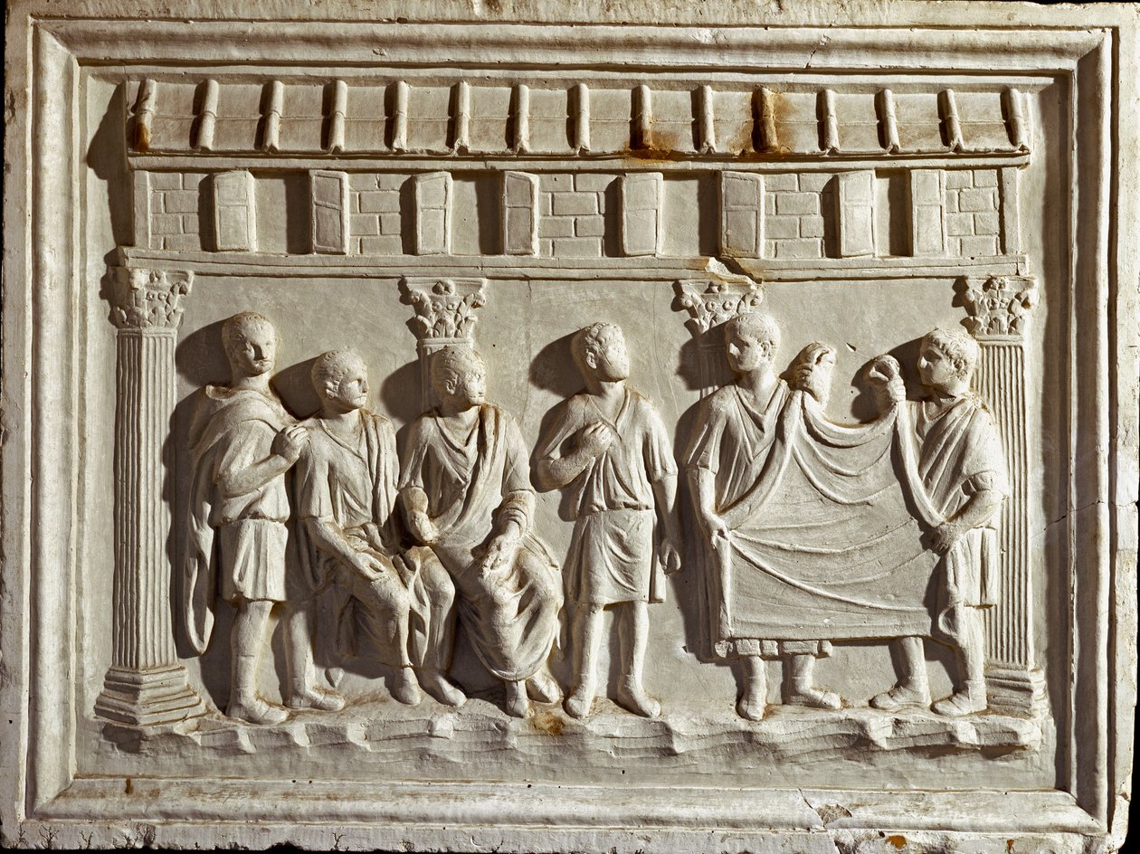 Art romain : moule en bas-relief représentant un tissu et des tapisseries. D