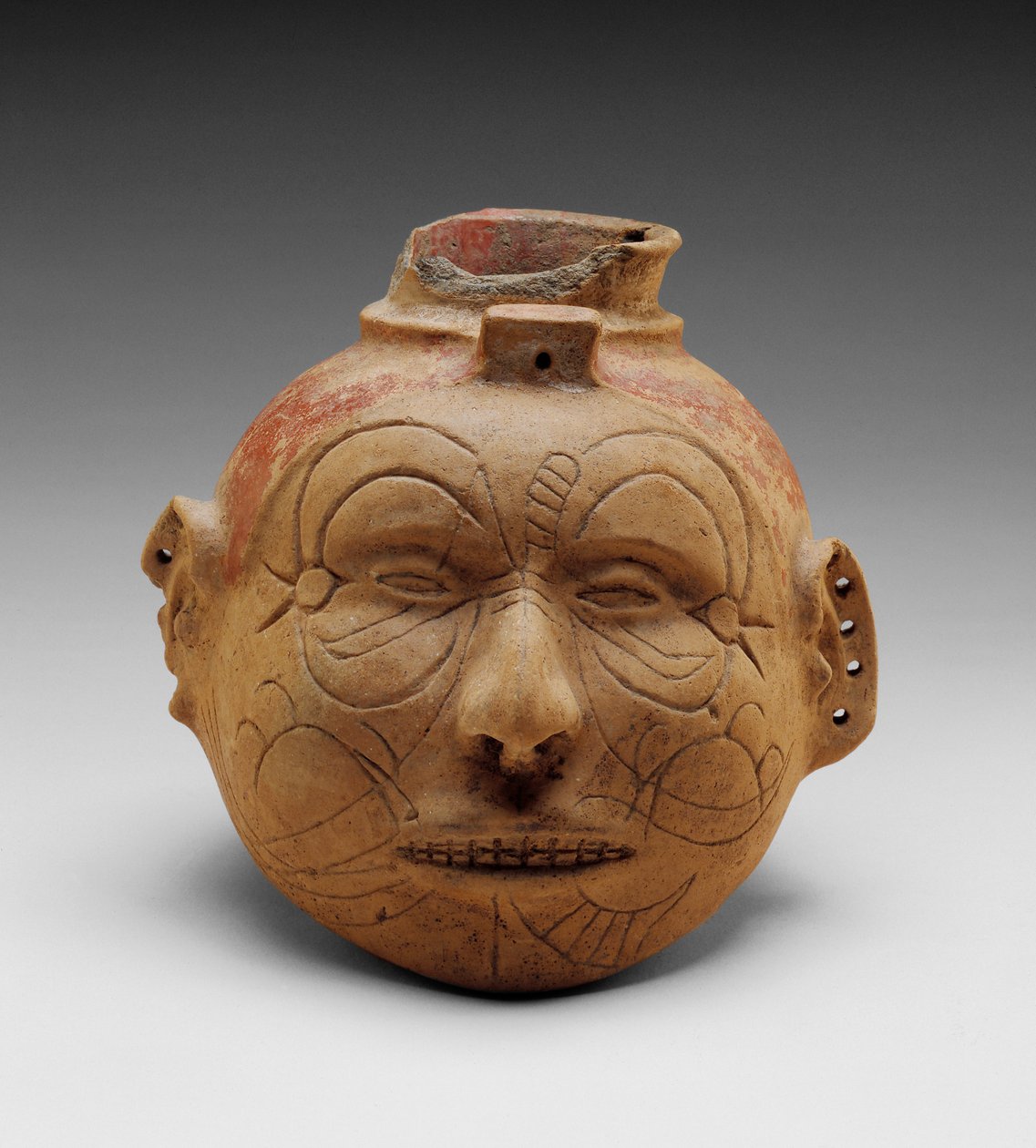 Vase effigie de tête - School American