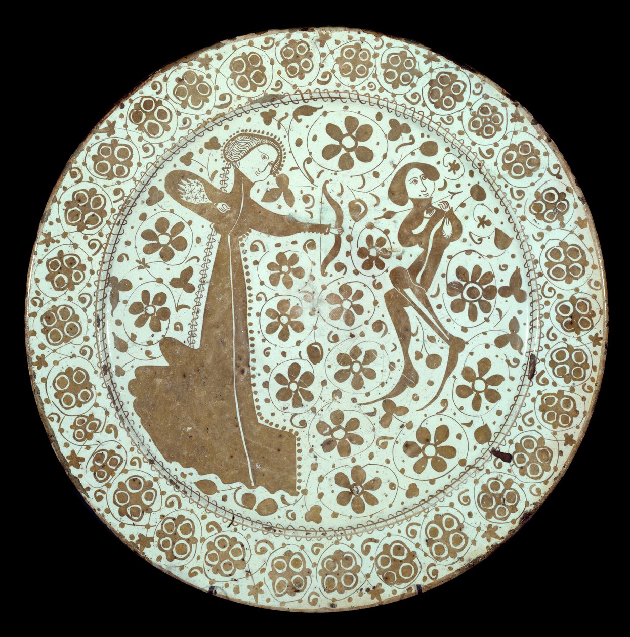 Dame tirant un arc sur un jeune homme dont le cou est traversé par une flèche. Plat en faïence de production espagnole. 16ème siècle Paris, Musée du Louvre - Spanish School