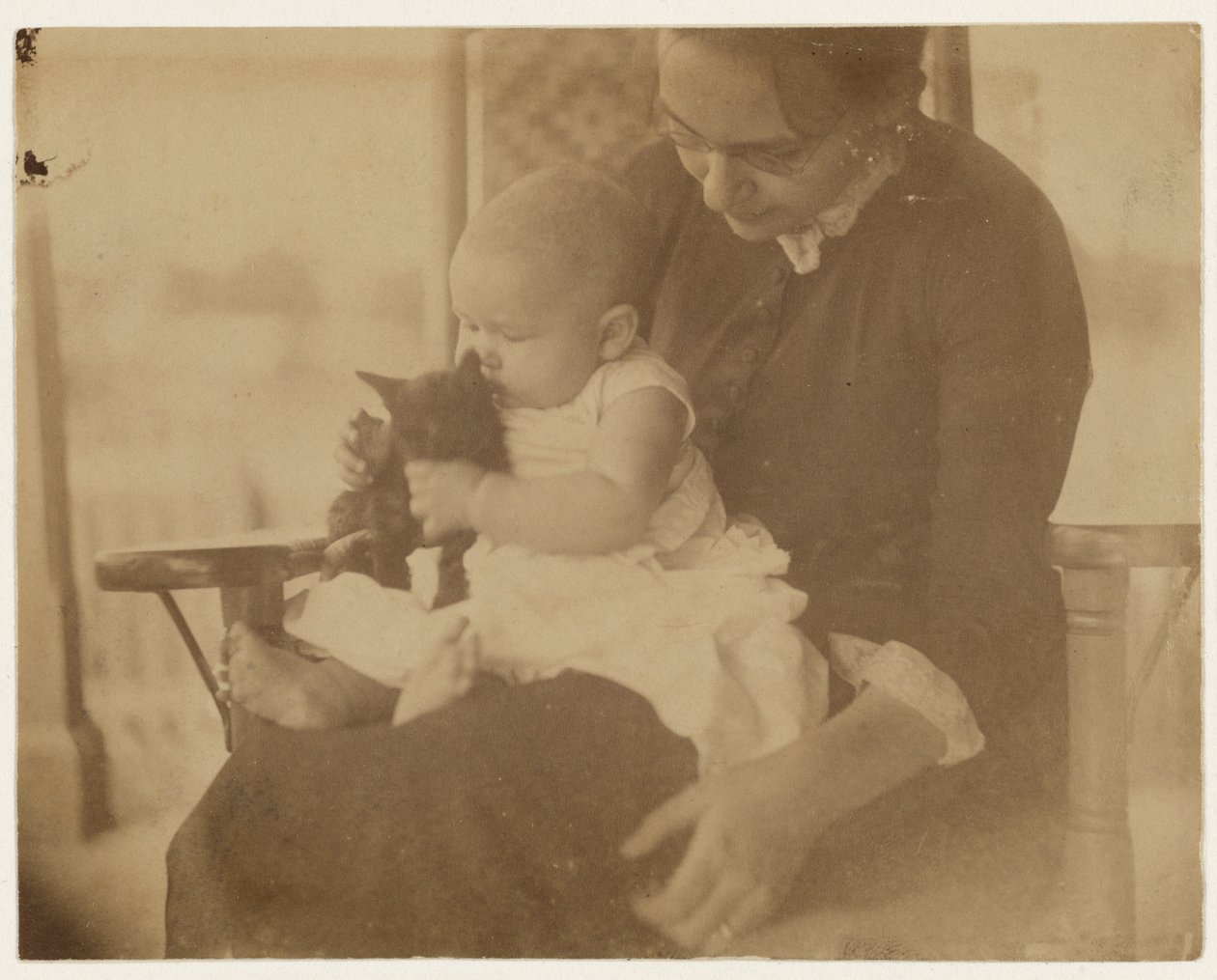 [Frances Crowell et enfant avec un chaton] - Thomas Eakins