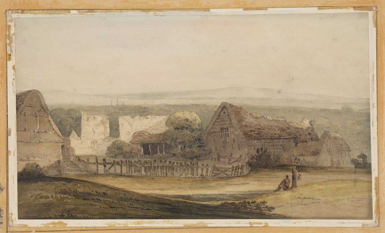 Un vaste bâtiment avec des dépendances agricoles et les ruines d