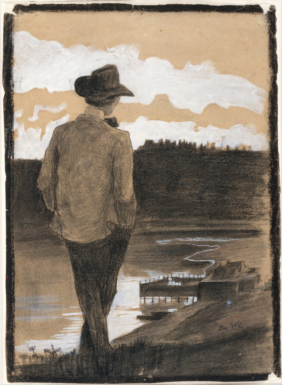 Jeune homme sur la rive d