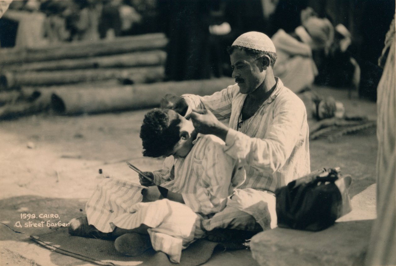Un barbier de rue, Le Caire, Égypte, 1936 - Unbekannt