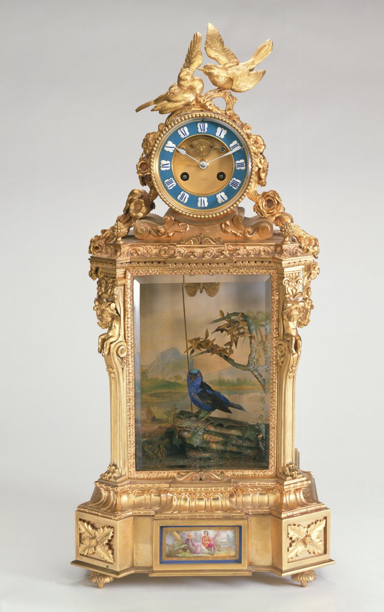 Pendule de cheminée, monture en porcelaine dorée, avec automate d