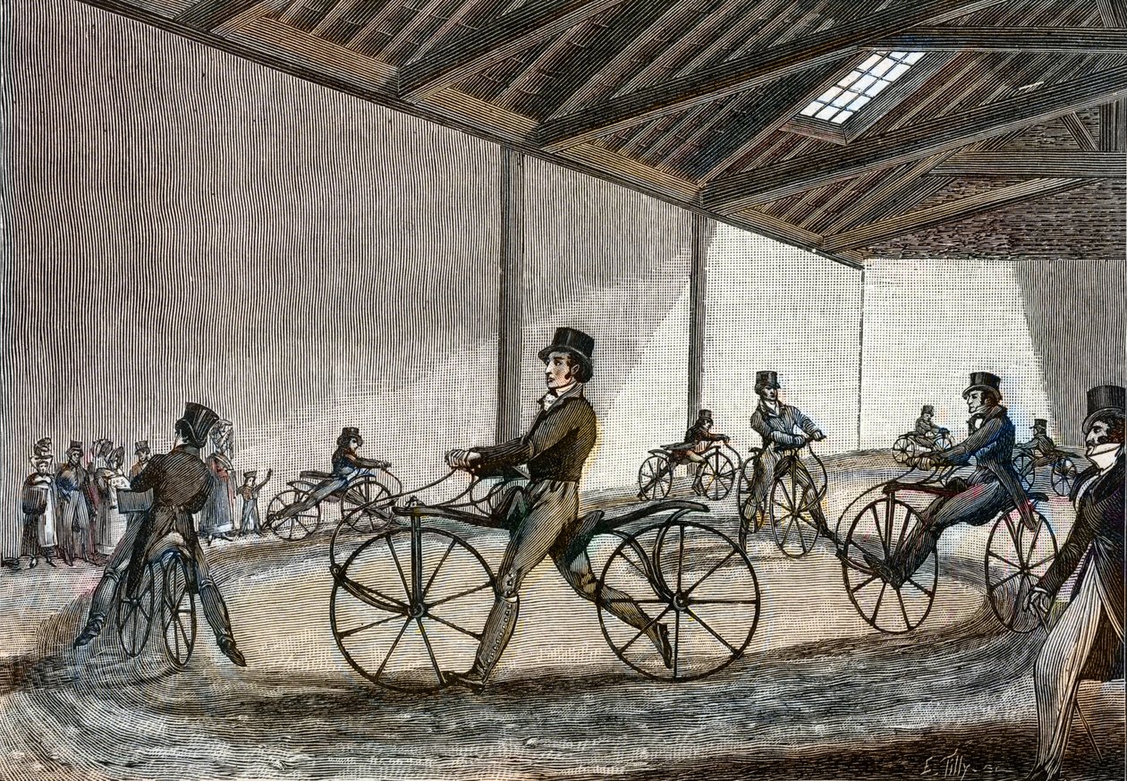 Vue intérieure du manège pour chevaux de bois. Homme conduisant des vélos (vélos sans pédales inventés par le baron Karl Drais) - Unknown artist