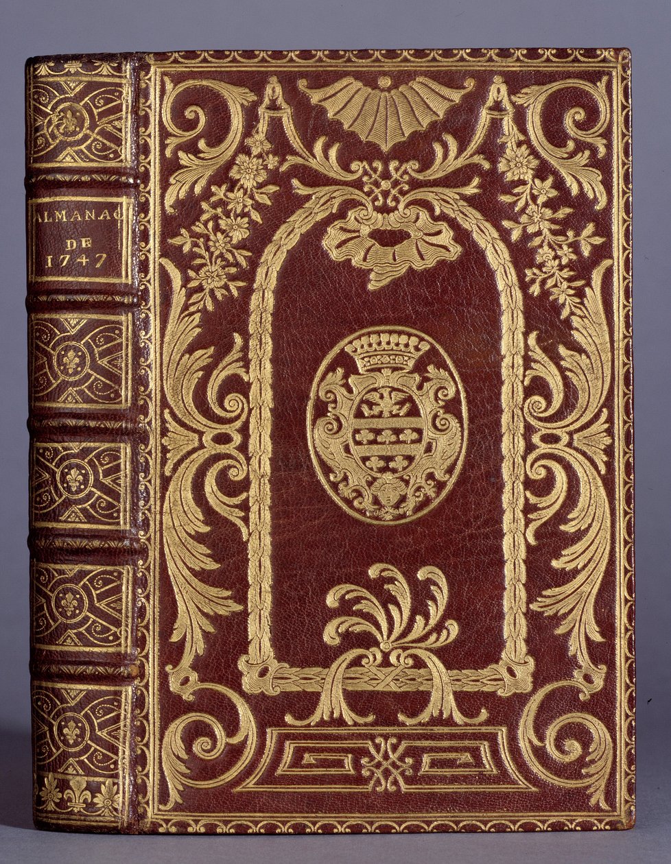 Couverture de livre, reliure avec ornements variés aux armes de la famille Cotte d