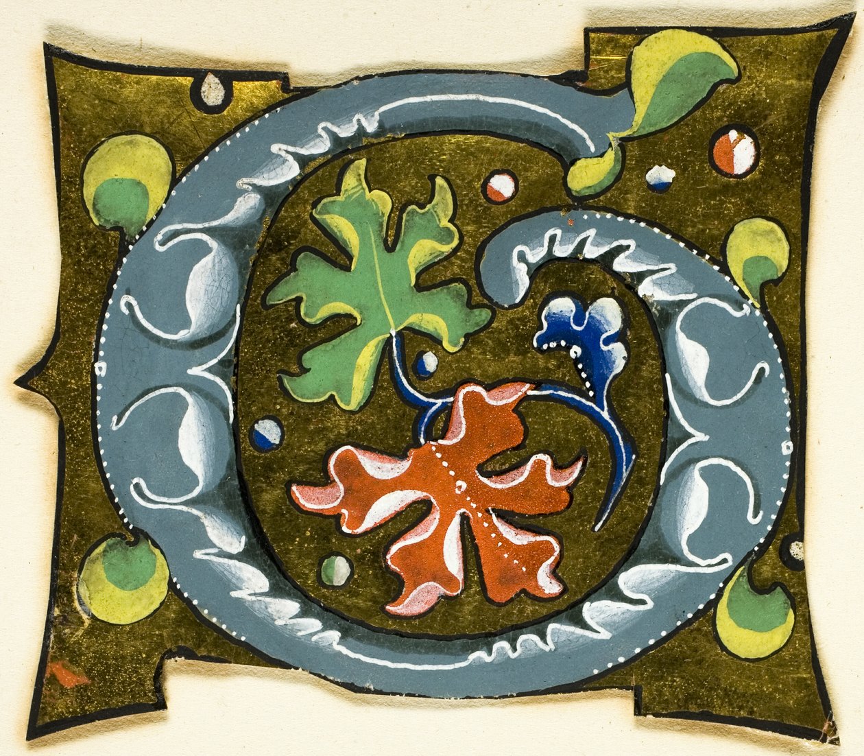 Initiale "G" décorée en gris avec des feuilles rouges, vertes et bleues provenant d