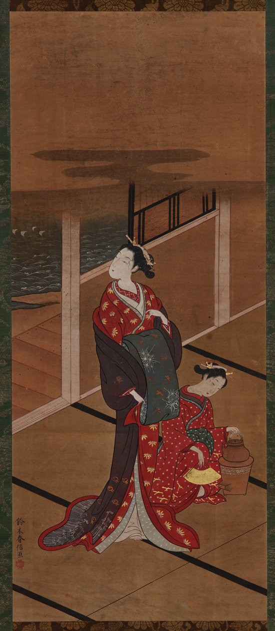 Intérieur : Une Yujo et une assistante chauffant de l