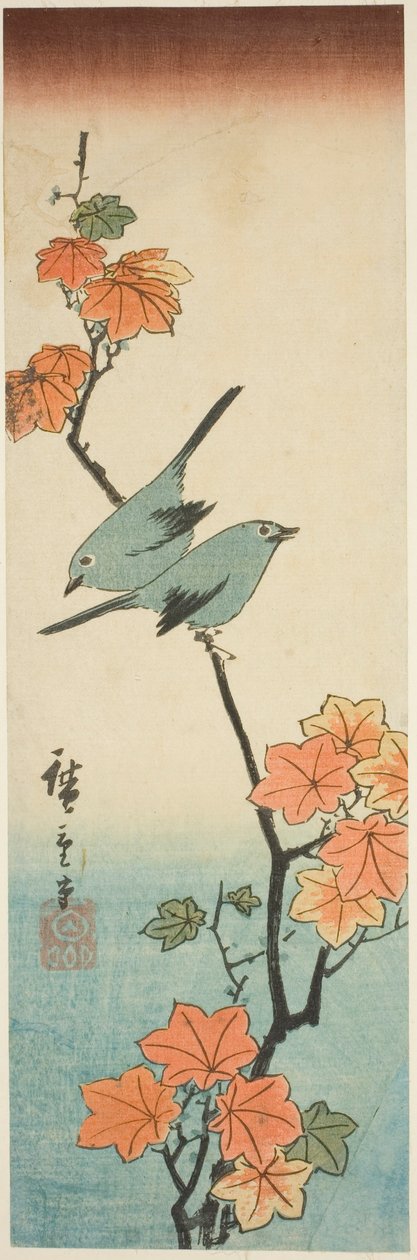 Mésanges japonaises sur une branche d