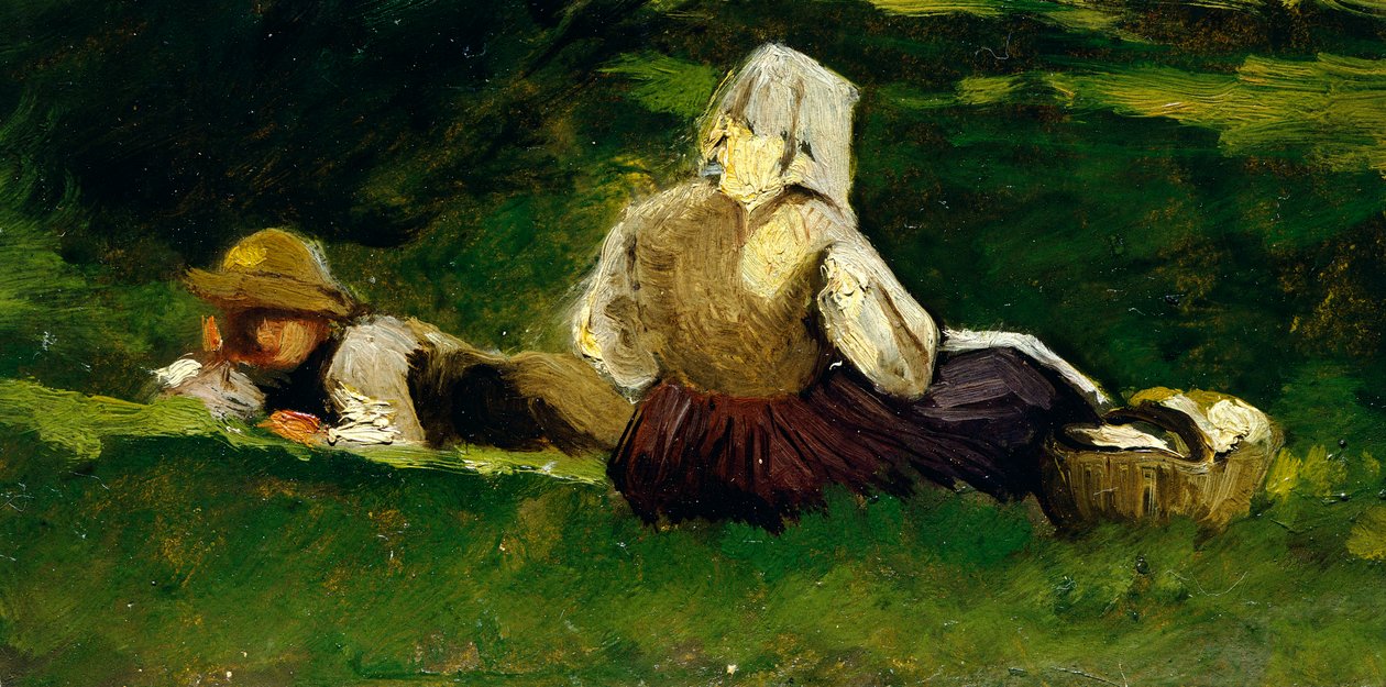 Femme assise et garçon allongé sur l