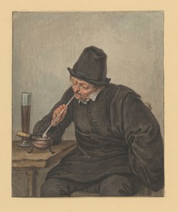 Homme assis allumant sa pipe