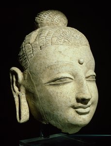 Tête de Bouddha souriant, style gréco-bouddhiste, d