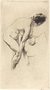 Femme nue se tenant la jambe