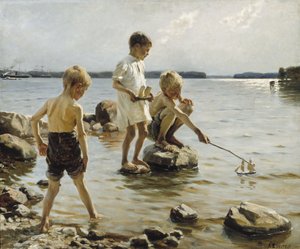 Garçons jouant sur le rivage