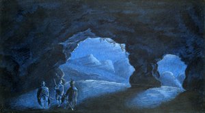 Trois hommes dans une grotte de montagne