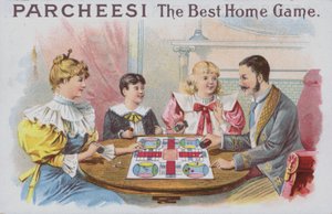 Famille jouant à un jeu de Parcheesi - American School