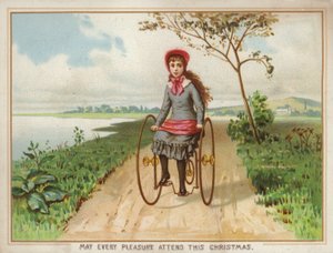 Fille roulant en tricycle à la campagne - American School