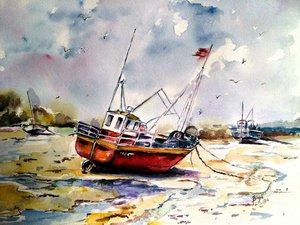Bateaux de pêche échoués à marée basse