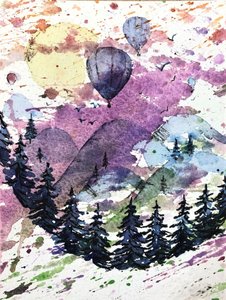 Des ballons colorés dans les montagnes