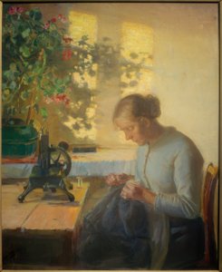 Fille de pêcheur cousant