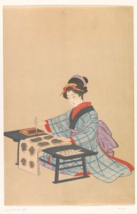 Femme calligraphiant
