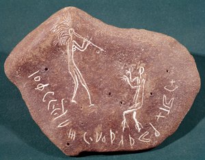 Pierre inscrite avec un danseur, un joueur de flûte et une inscription safaitique, 1er siècle av. J.-C.-3e siècle ap. J.-C.