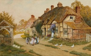 Enfants jouant devant un cottage dans un village