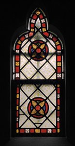 Fenêtre de confessionnal dans la chapelle de la Dame