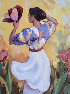 Une femme dans un jardin fleuri