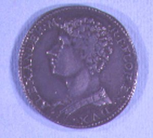 Pièce de monnaie décorée de la tête d