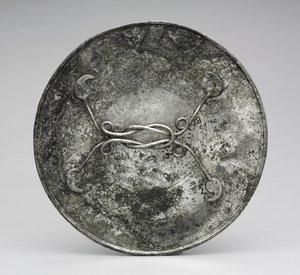 Miroir avec un manche en forme de nœud d