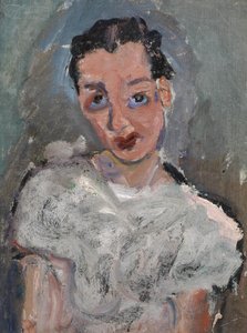 Jeune femme en blouse blanche