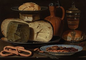 Nature morte avec fromages, amandes et bretzels
