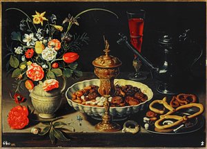 Table avec pichet, fleurs, fruits secs ...