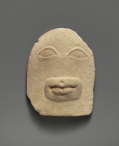 Relief votif en calcaire des yeux et d