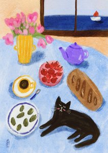 Petit-déjeuner relaxant au bord de la mer avec un chat