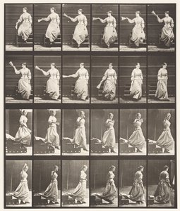 Descendre les escaliers en regardant autour et en agitant un éventail - Eadweard Muybridge