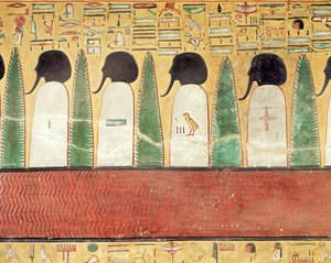 Relief représentant des dieux à tête noire dans l