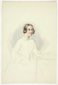 Jeune femme à un bureau d