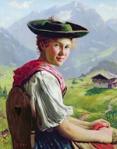 Fille avec un chapeau dans un paysage de montagne