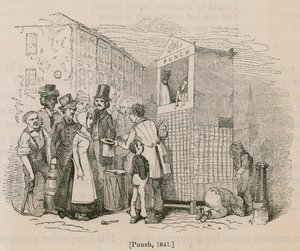 Une foule se rassemble pour regarder un spectacle de Punch et Judy - English School