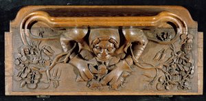 Une miséricorde représentant un ogre avec des épaules énormes, New College Chapel, Oxford, fin du 14ème siècle