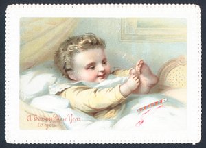 Bébé au lit jouant avec ses orteils, carte de Nouvel An - English School
