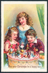Dame et enfants admirant le gâteau de Noël - English School