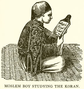 Garçon musulman étudiant le Coran - English School