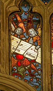 Fenêtre n2 représentant la chorale angélique avec une partition musicale