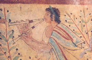 Art étrusque : un joueur de flûte. Détail d